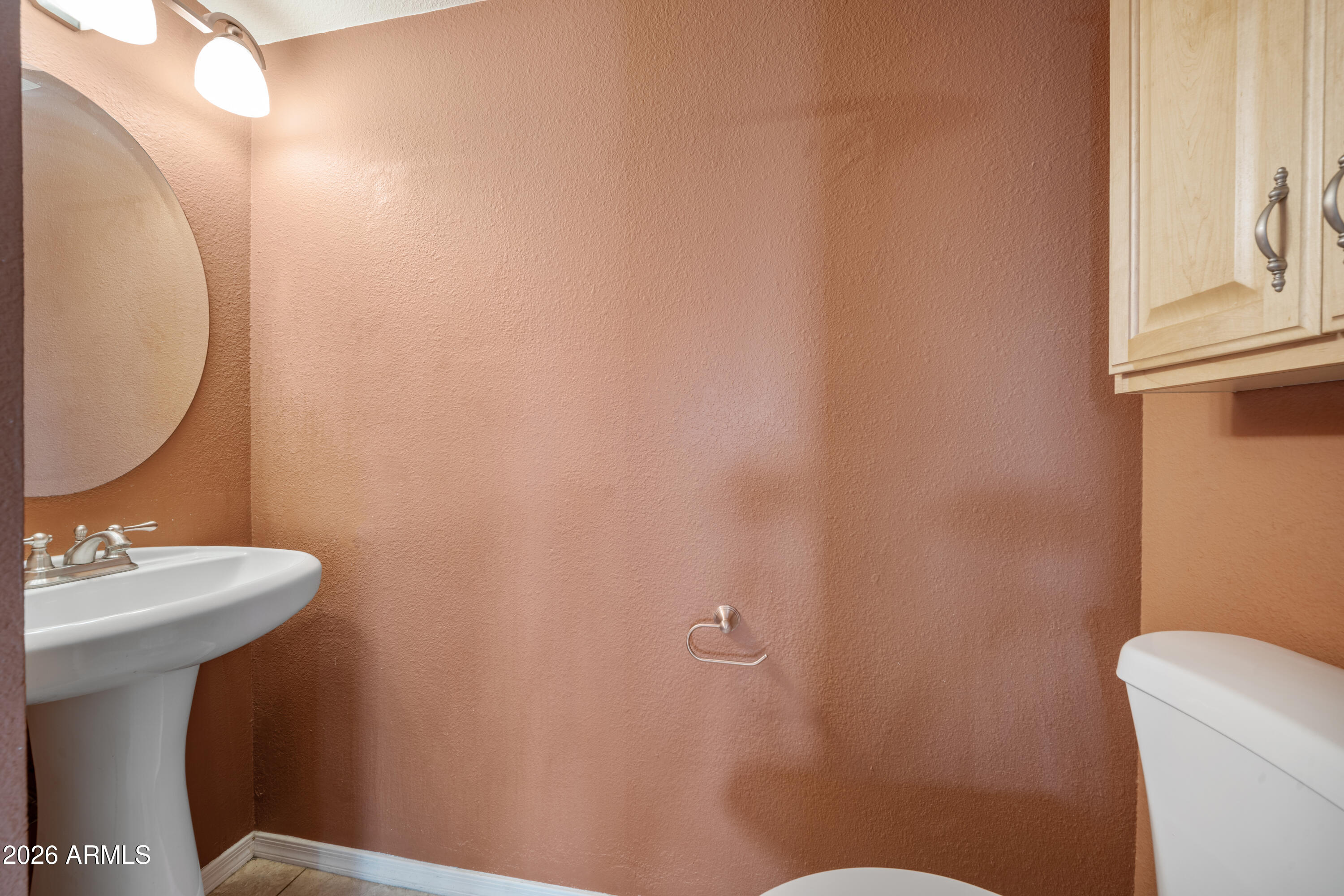 13230 North 3rd Way Phoenix, AZ 85022 - Photo 10 of 22 a bathroom with a sink mirror and toilet