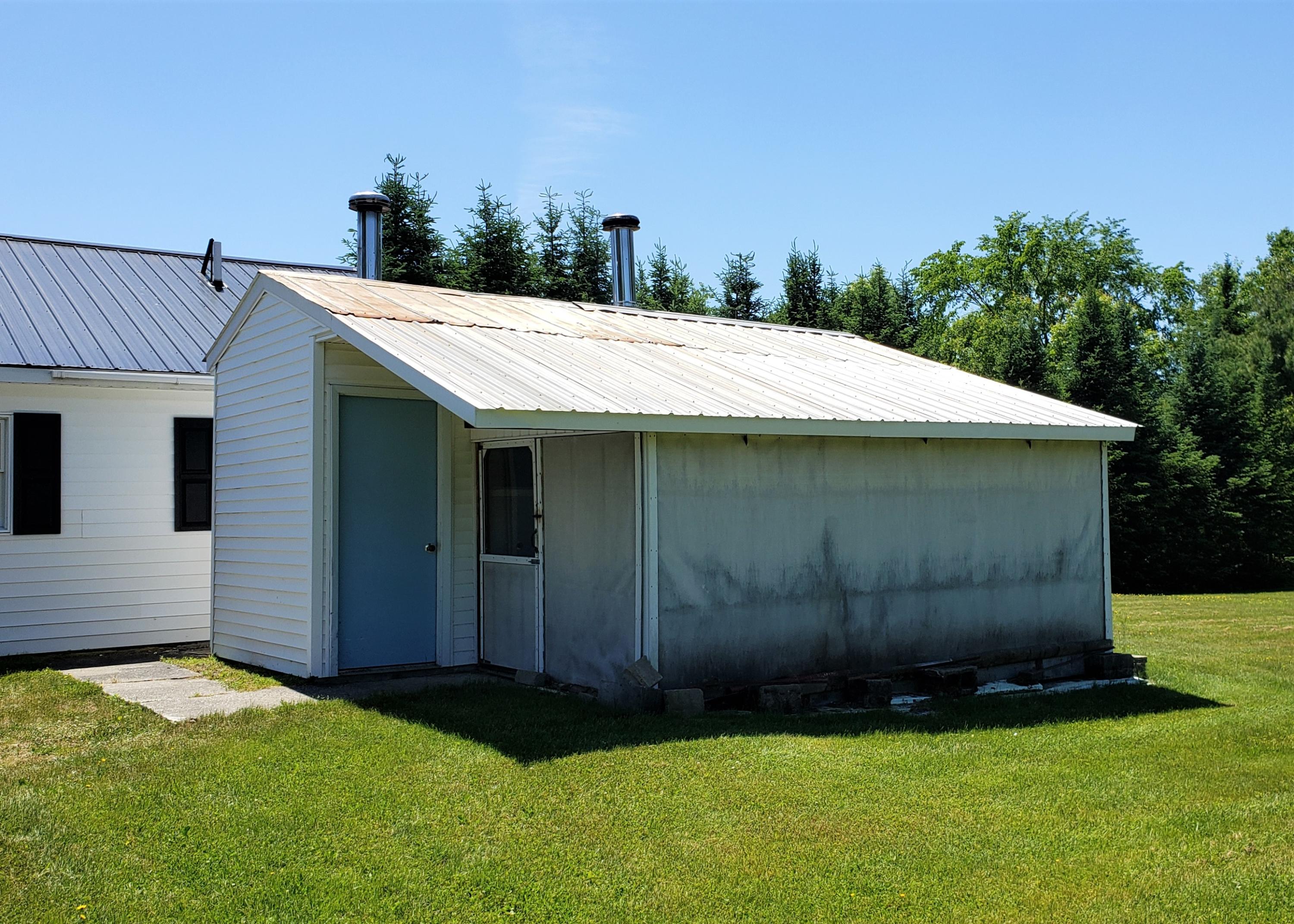 388 East Benton Road Waterville, ME 04901 - Photo 32 of 38 Shed Housing Generator