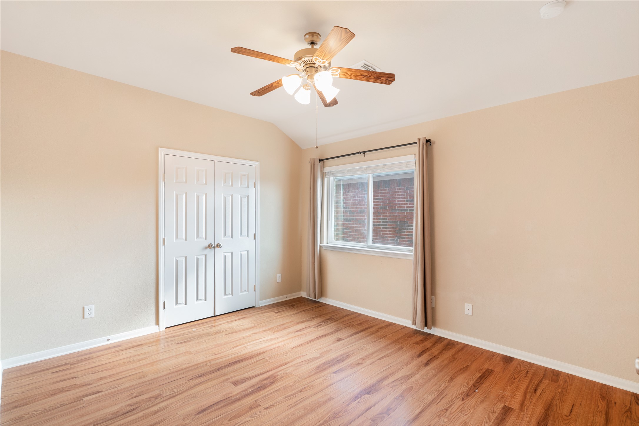 16622 Dover Mills Drive Spring, TX 77379 - Photo 12 of 20 a view of an empty room with wooden floor