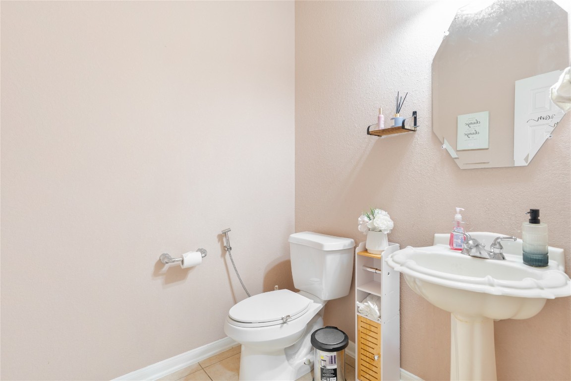 16622 Dover Mills Drive Spring, TX 77379 - Photo 15 of 20 a bathroom with a sink and a toilet