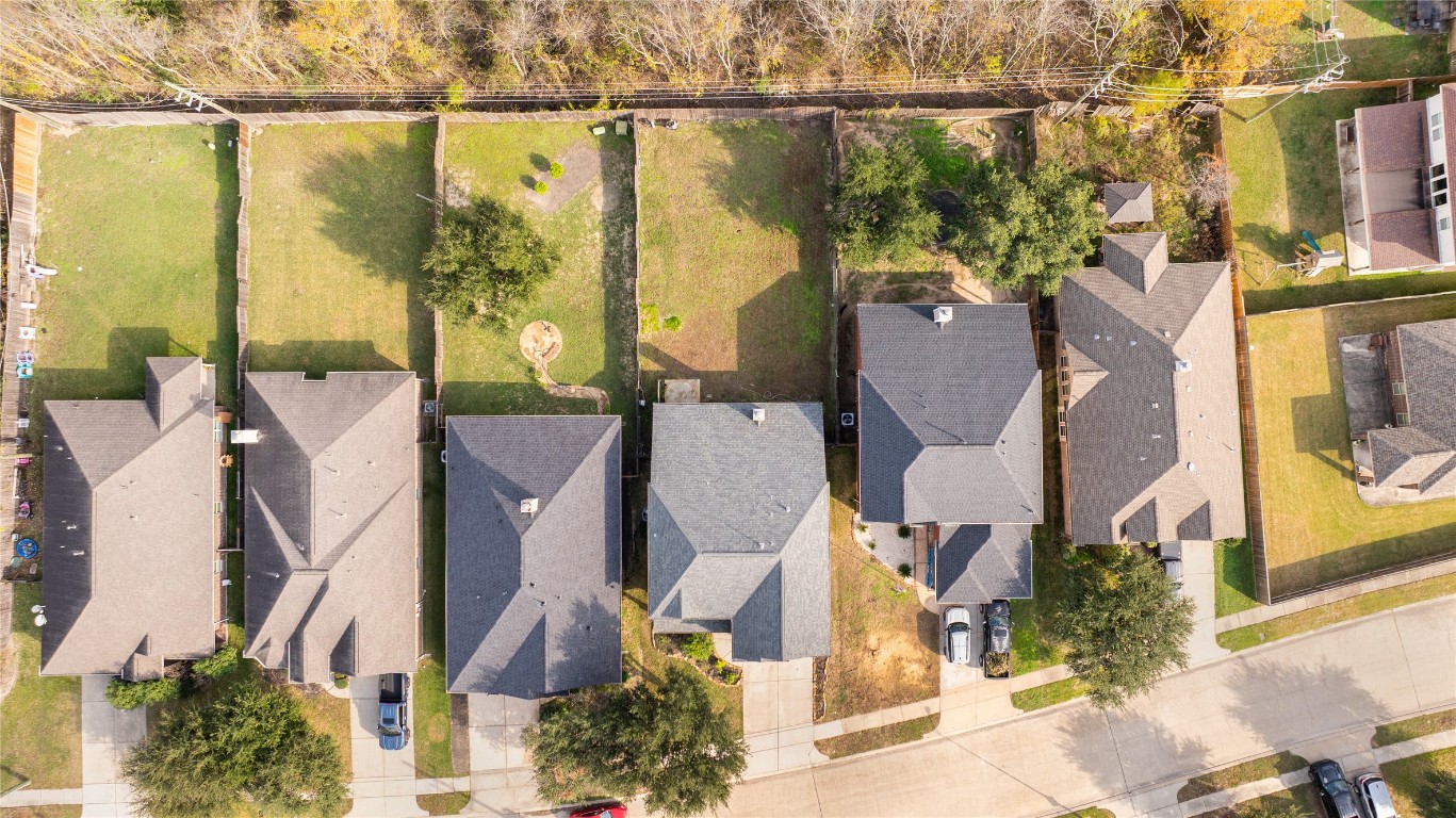 16622 Dover Mills Drive Spring, TX 77379 - Photo 17 of 20 an aerial view of residential houses with outdoor space and parking