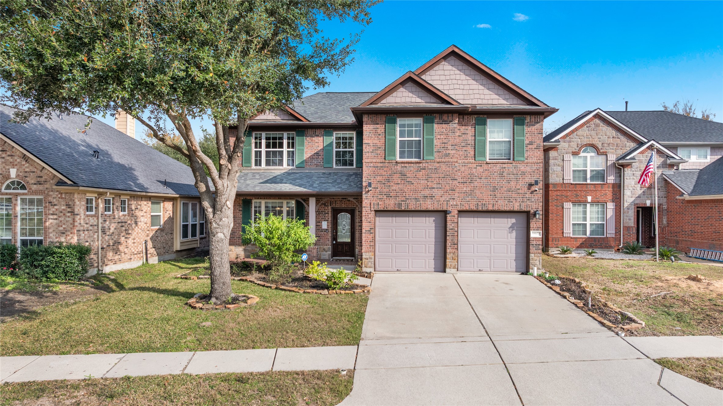 16622 Dover Mills Drive Spring, TX 77379 - Photo 18 of 20 a front view of a house with garden