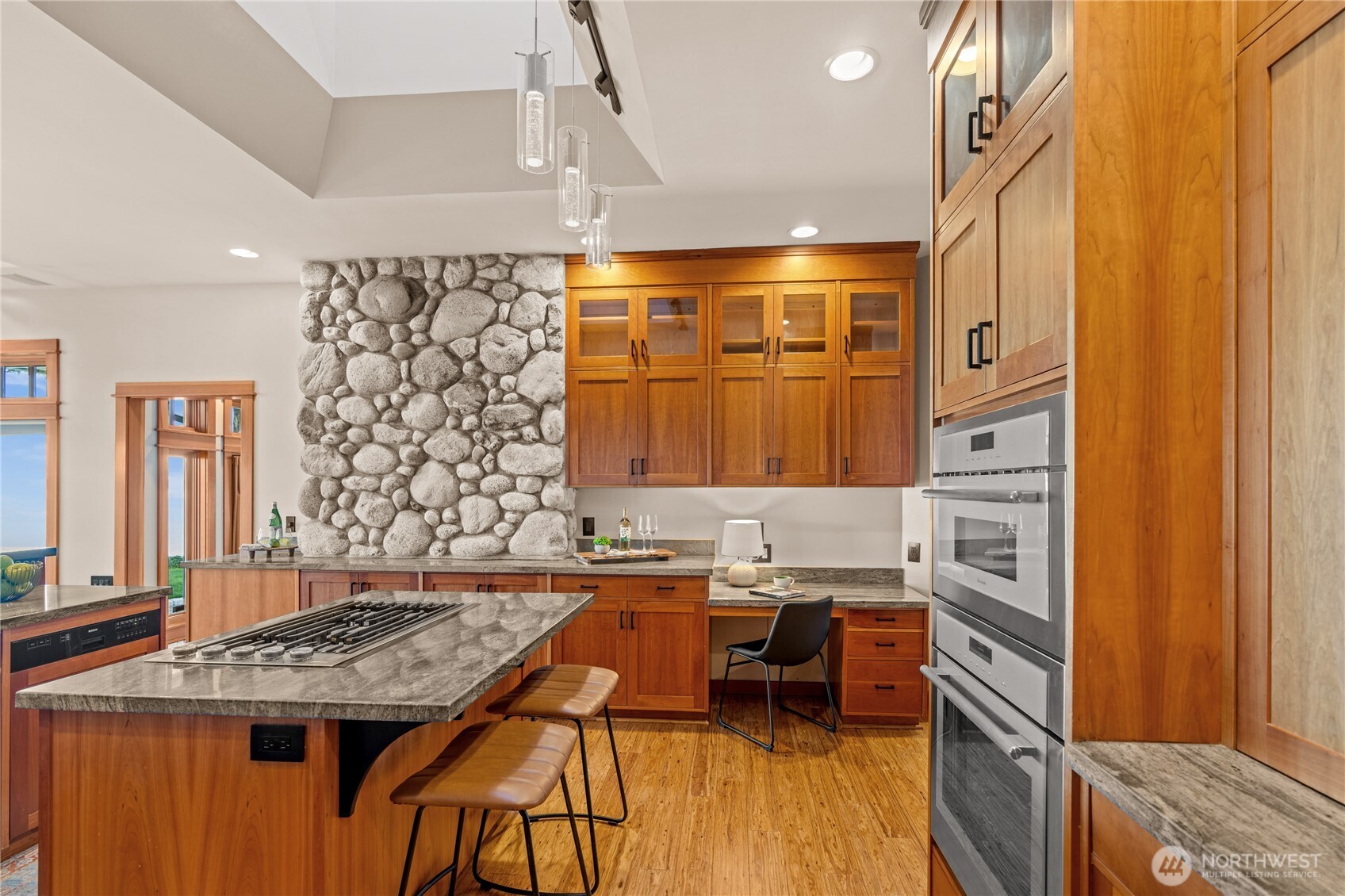 33244 Eglon Road Northeast Kingston, WA 98346 - Photo 11 of 40 a kitchen that has a lot of cabinets in it