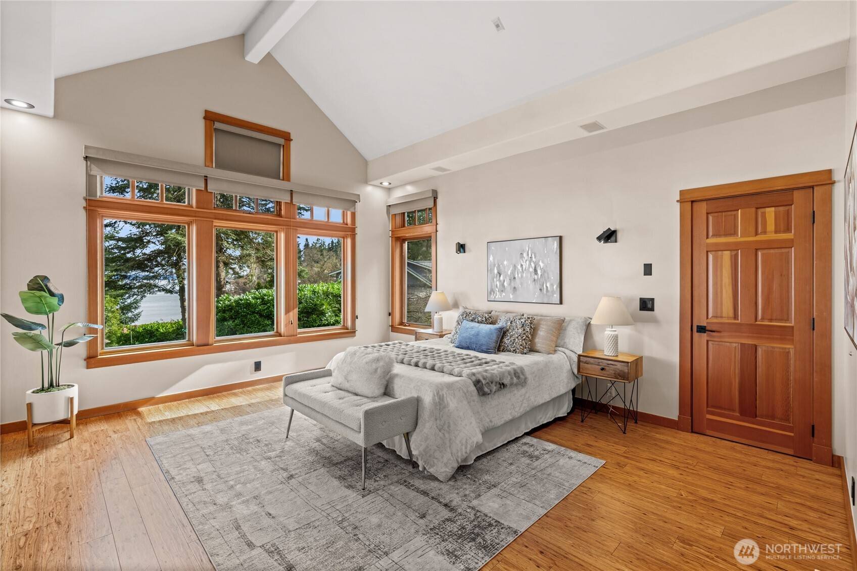 33244 Eglon Road Northeast Kingston, WA 98346 - Photo 13 of 40 a spacious bedroom with a bed and a large window