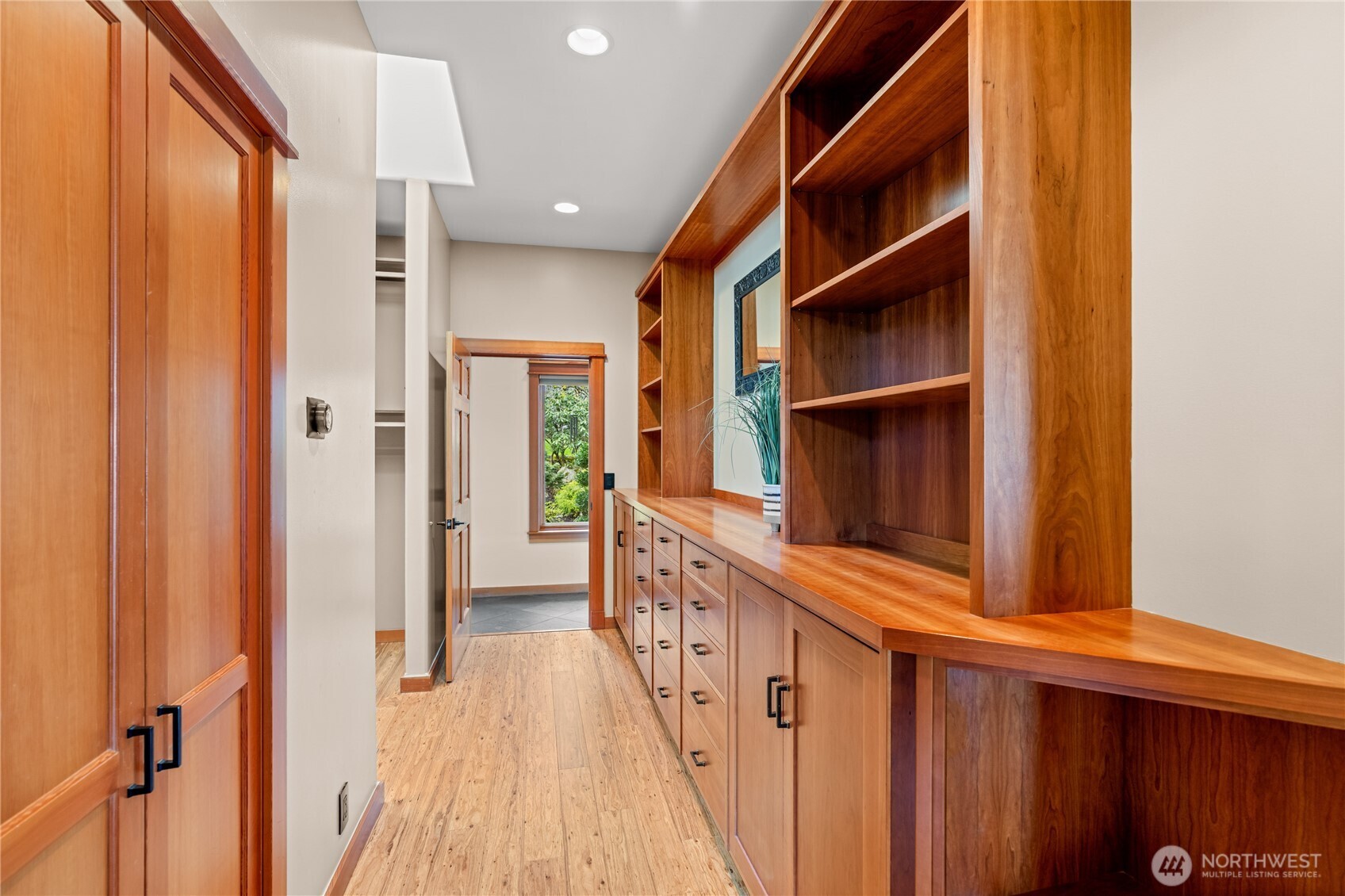 33244 Eglon Road Northeast Kingston, WA 98346 - Photo 16 of 40 a view of a hallway with wooden shelves