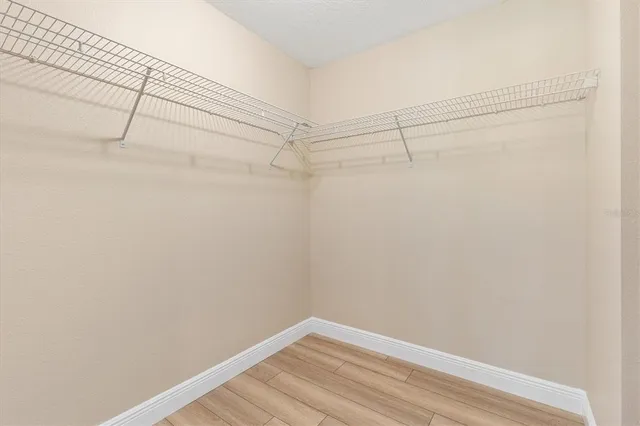 a view of a room with racks on the wall