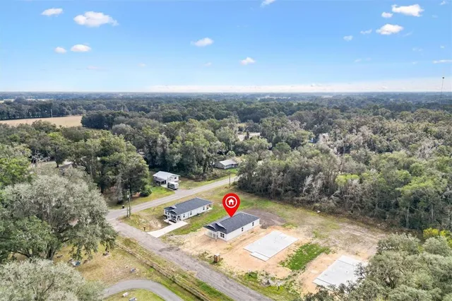 an aerial view of beach and residential houses