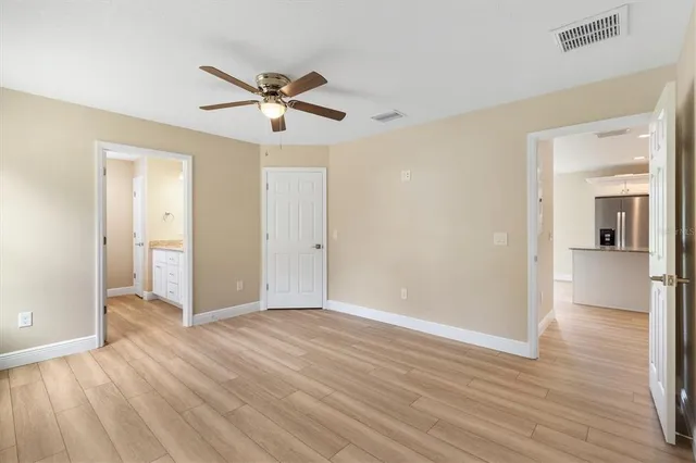a view of a livingroom with wooden floor