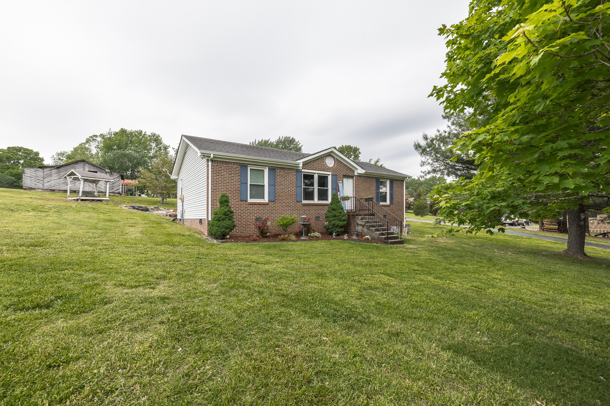 3000 Tom Austin Highway Springfield, TN 37172 - Photo 3 of 32 a house view with a garden space