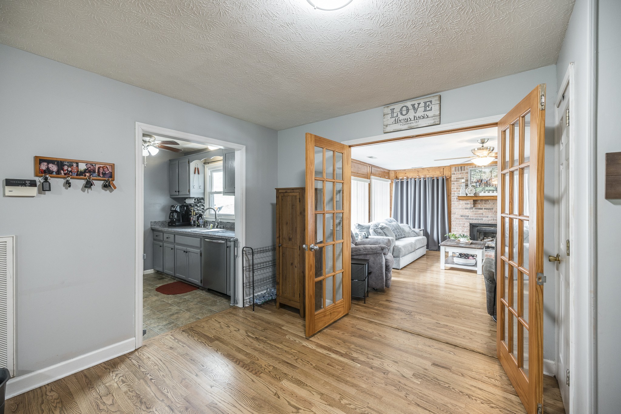 3000 Tom Austin Highway Springfield, TN 37172 - Photo 9 of 32 a kitchen with a refrigerator and wooden floor