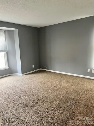 an empty room with a natural light