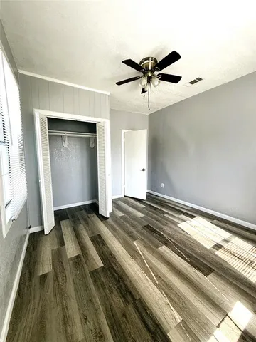 a view of house with backyard