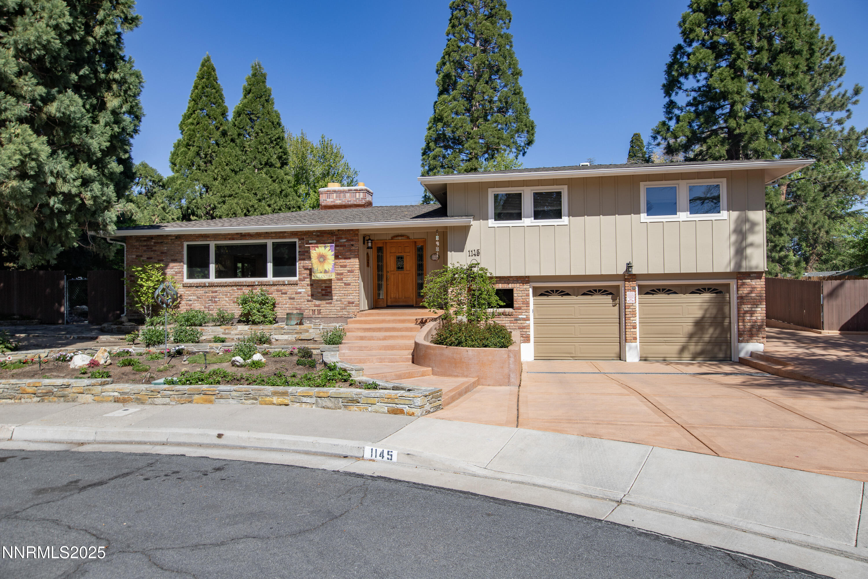 1145 Alpine Circle Reno, NV 89509 - Photo 1 of 36 front view of a house with a yard
