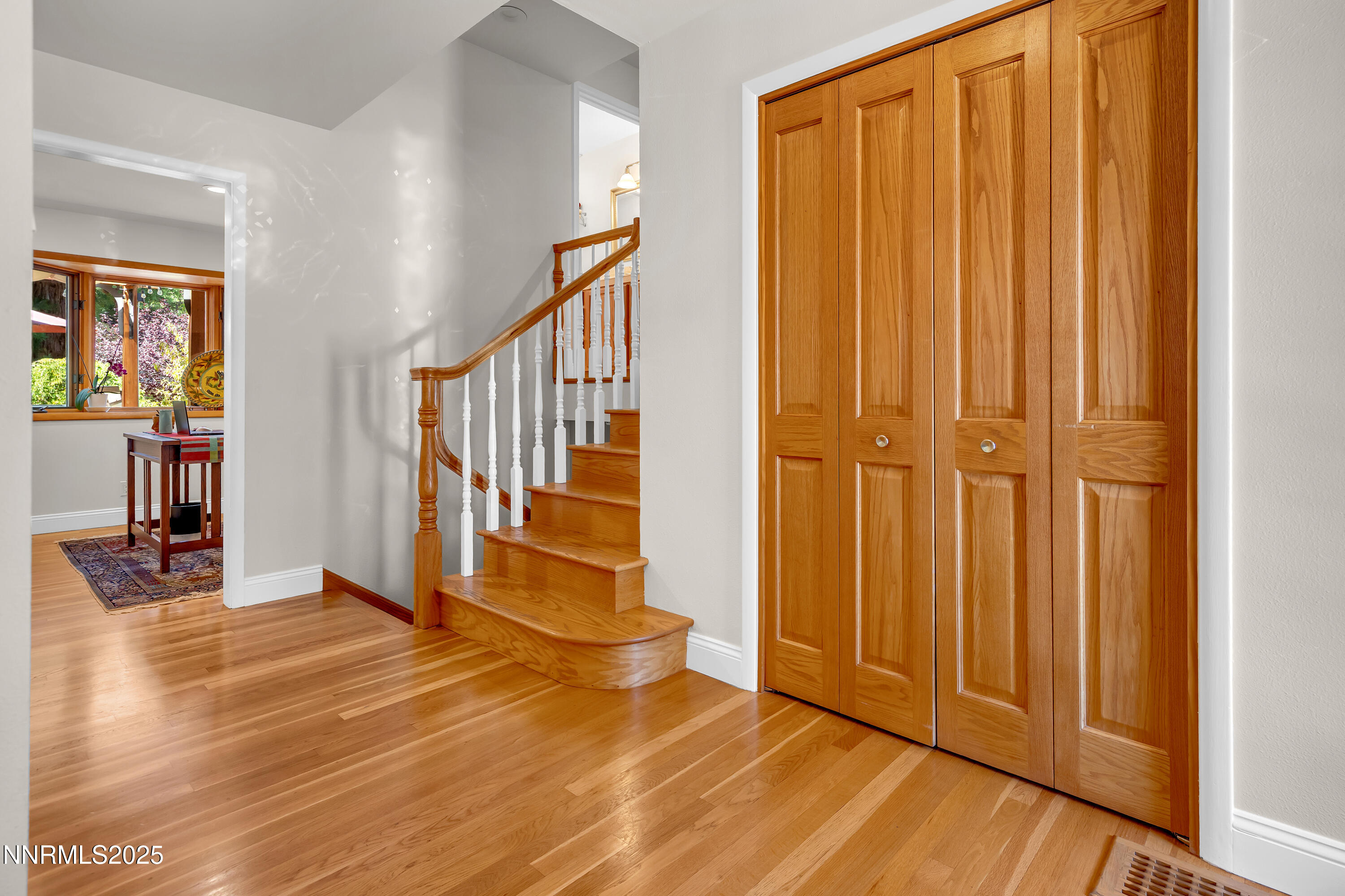 1145 Alpine Circle Reno, NV 89509 - Photo 20 of 36 a view of an entryway with wooden floor