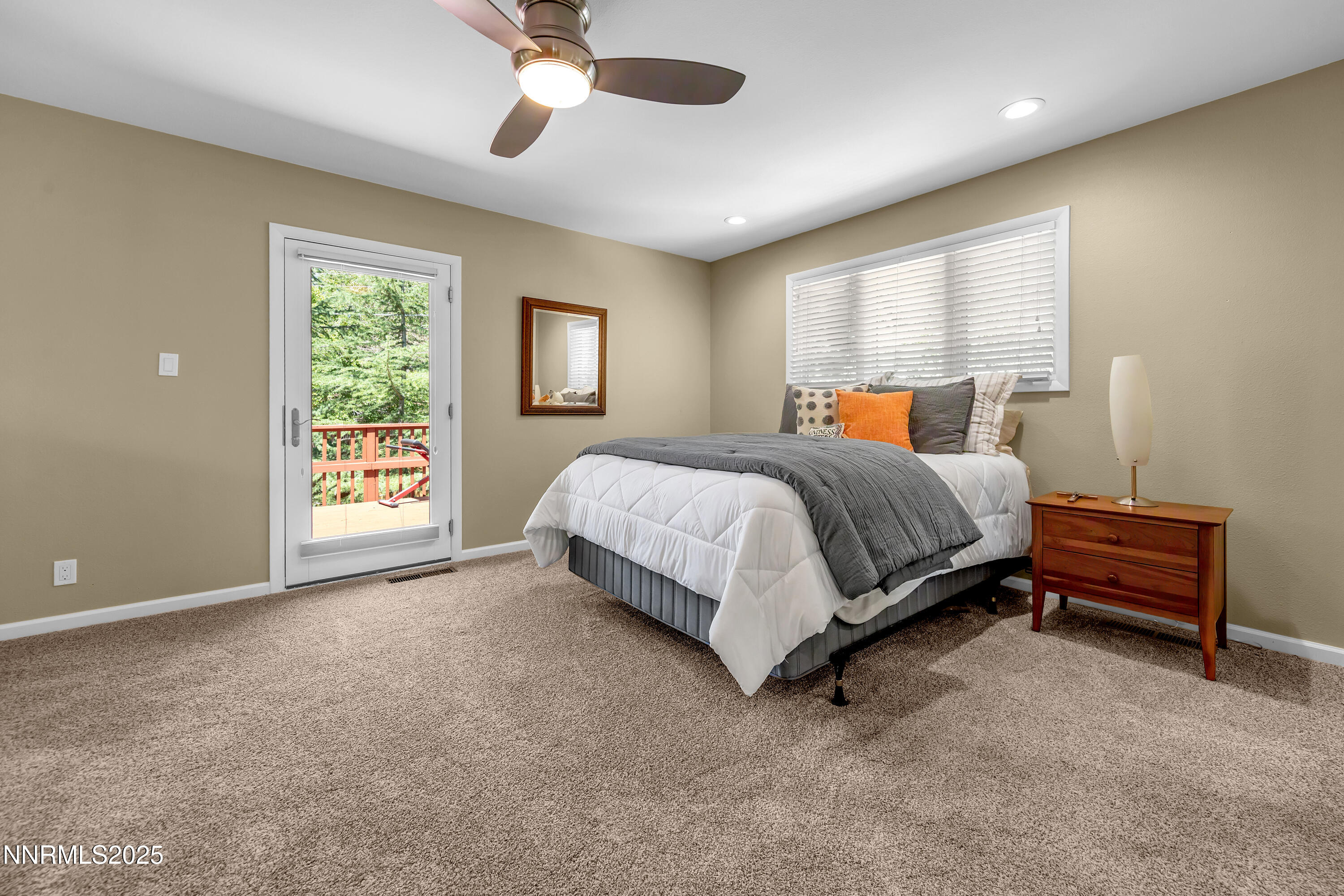 1145 Alpine Circle Reno, NV 89509 - Photo 21 of 36 a bed room with a bed and a window