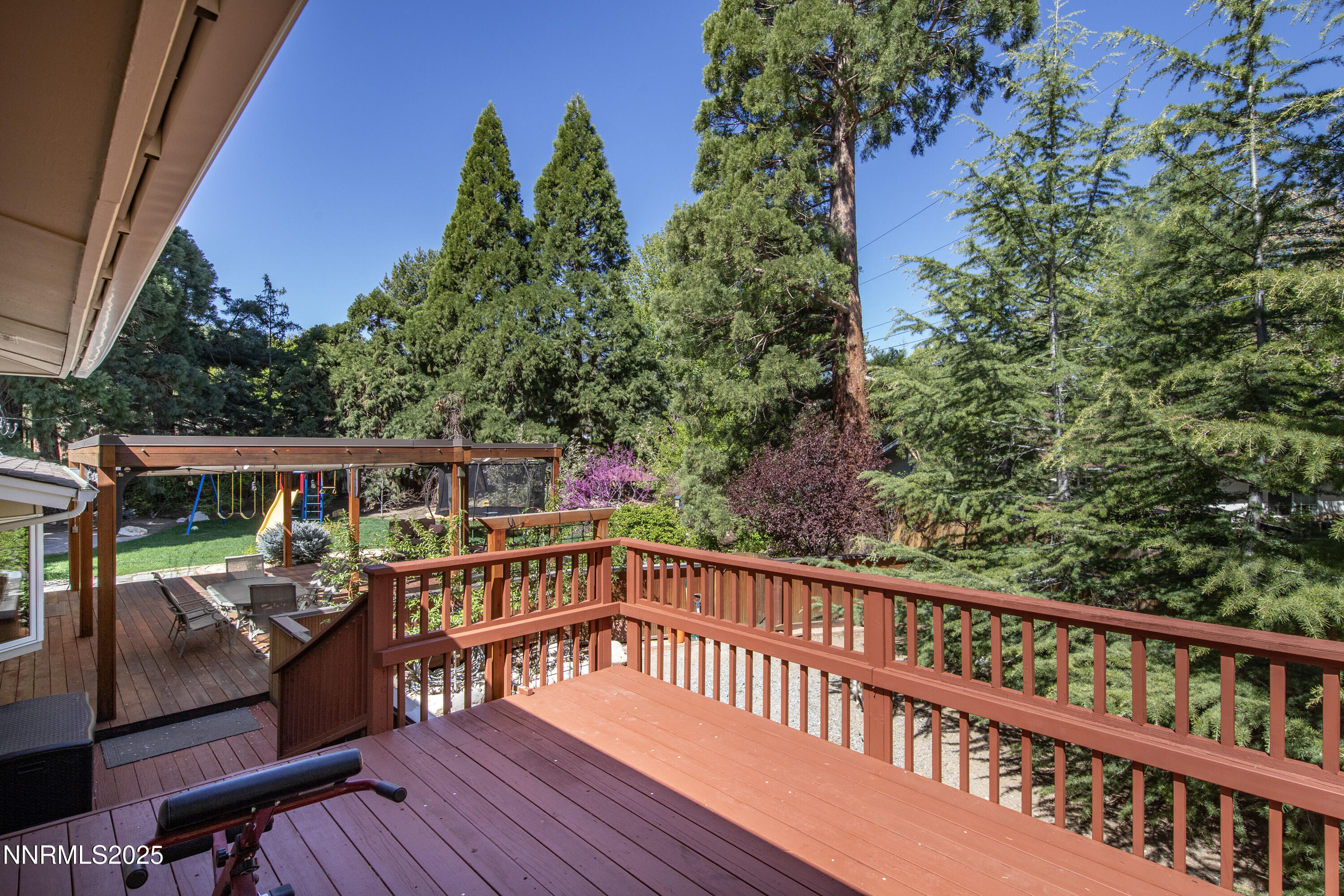 1145 Alpine Circle Reno, NV 89509 - Photo 22 of 36 a view of a roof deck with wooden floor and seating space