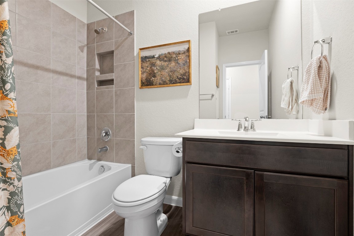 14239 Volcano Perch Drive Conroe, TX 77384 - Photo 25 of 39 a bathroom with a sink toilet and shower