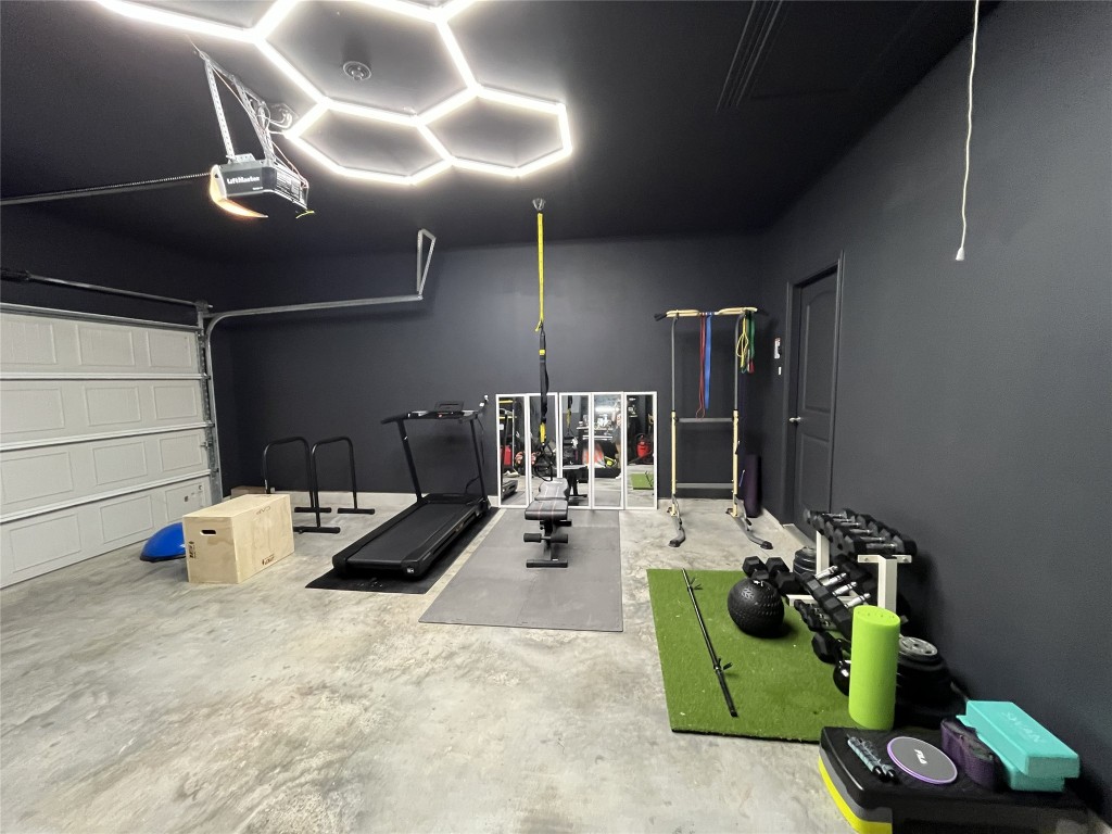 14239 Volcano Perch Drive Conroe, TX 77384 - Photo 28 of 39 a view of a room with gym equipment