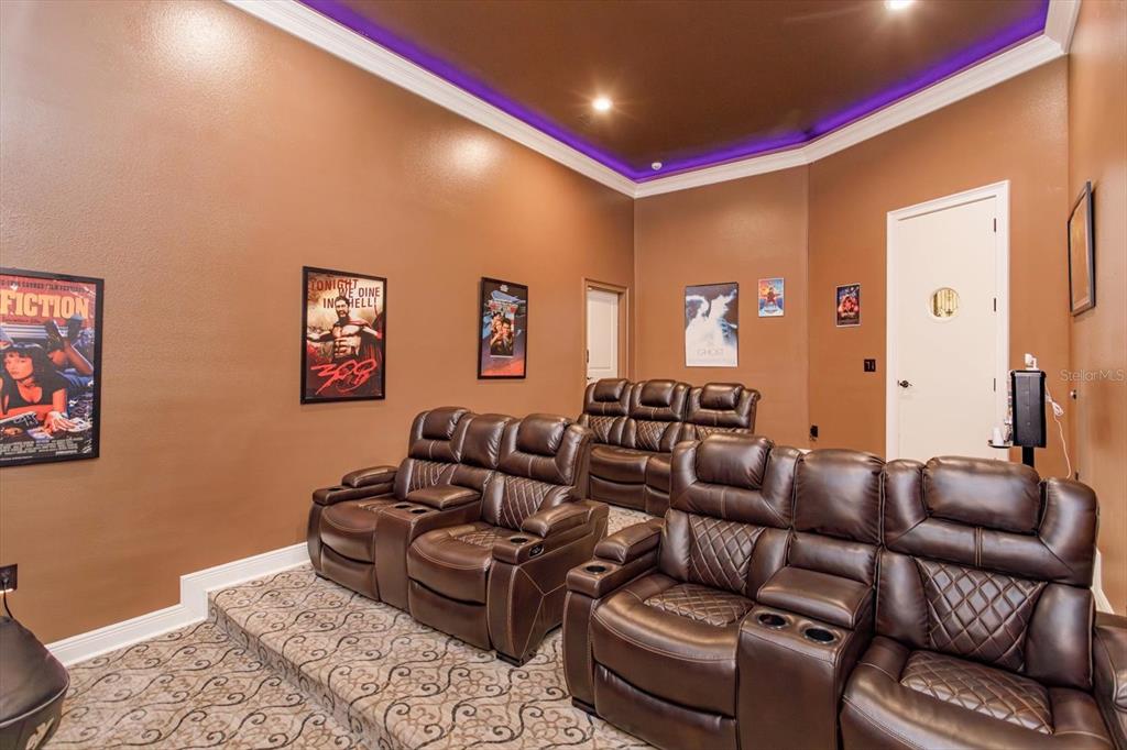 5719 Emerson Pointe Way Orlando, FL 32819 - Photo 27 of 50 a living room with furniture