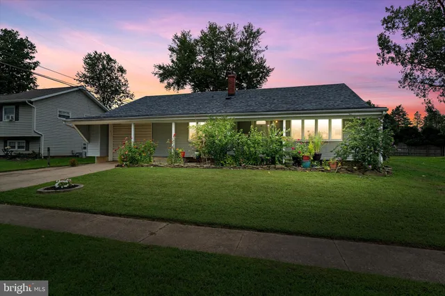 a front view of house with yard