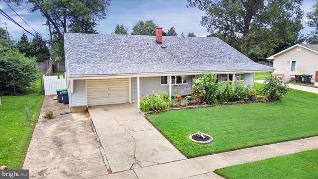 a view of backyard with a deck and wooden floor