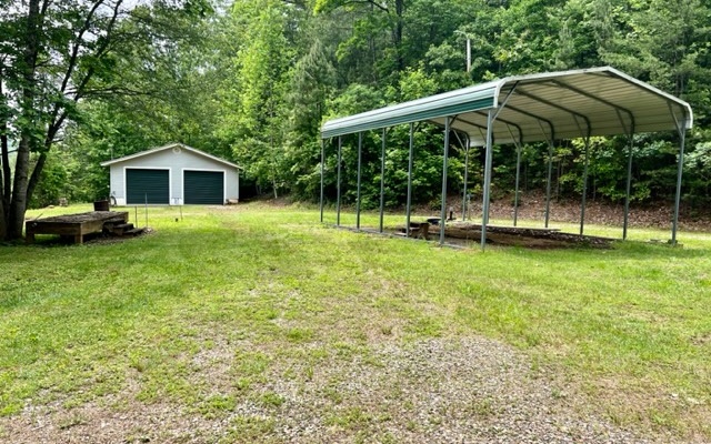 689 McDonald Road Murphy, NC 28906 - Photo 5 of 10 a view of a garden with a slide