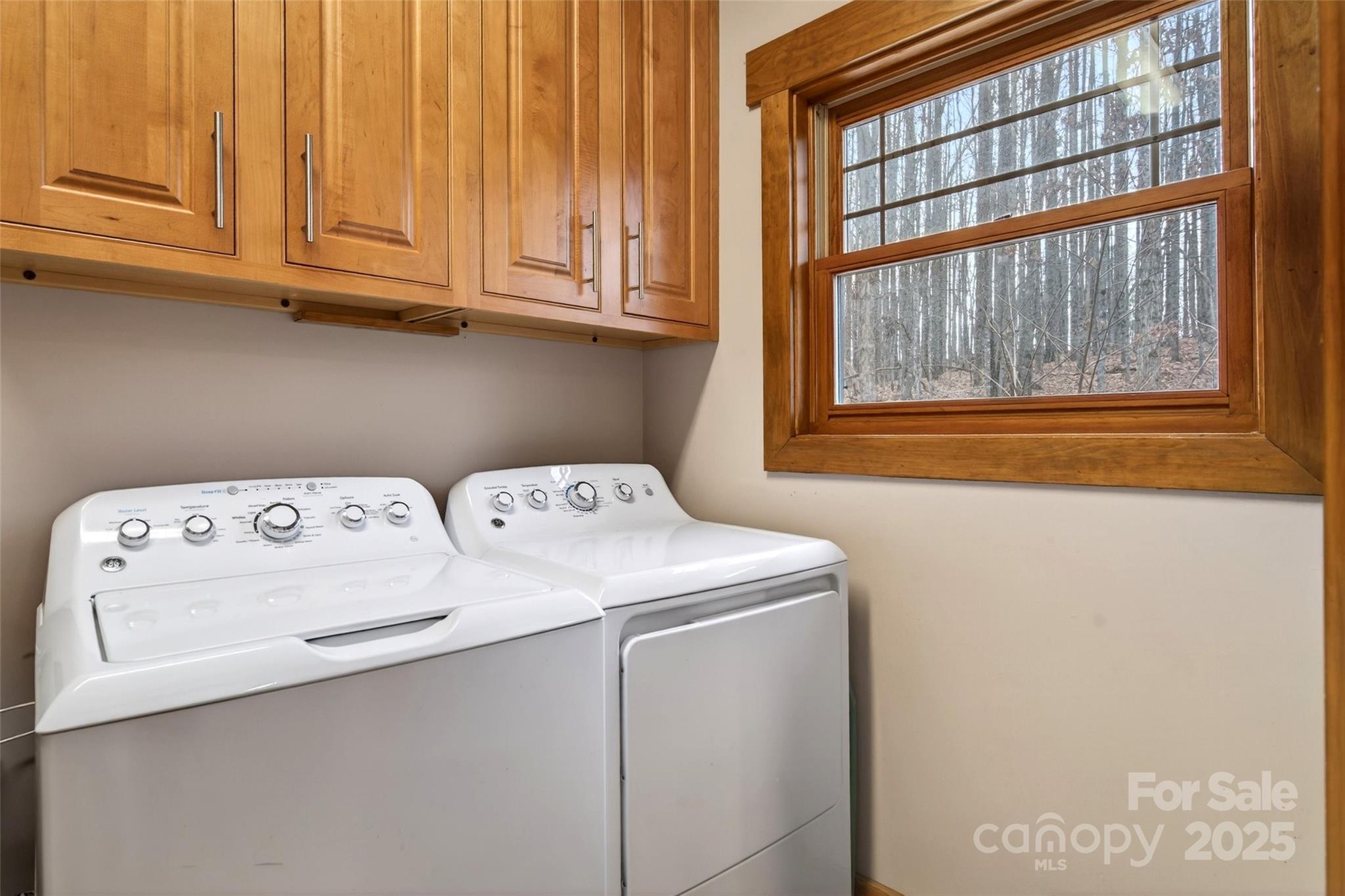 242 Lakeview Trail Nebo, NC 28761 - Photo 14 of 46 a utility room with dryer and washer