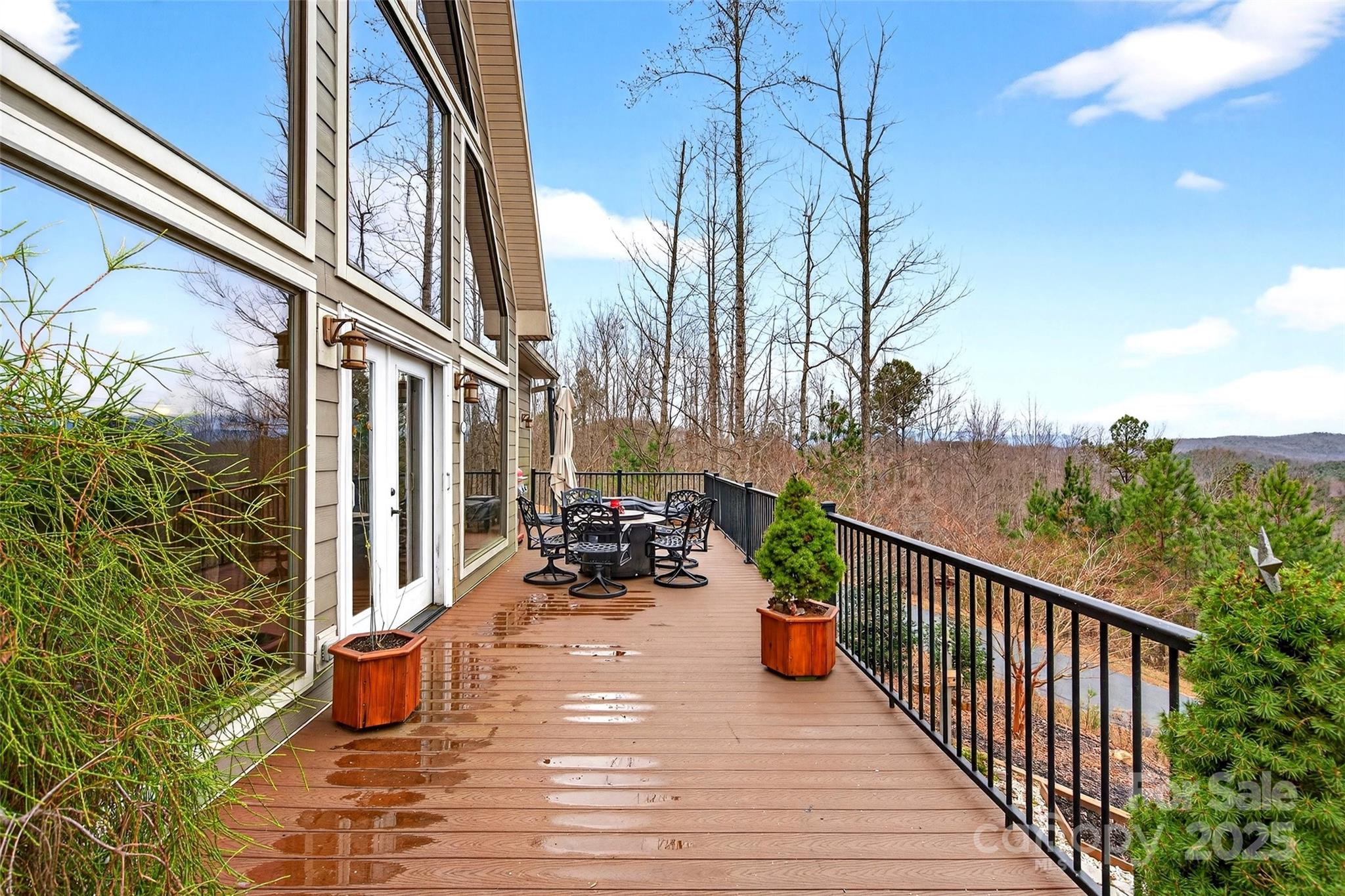 242 Lakeview Trail Nebo, NC 28761 - Photo 17 of 46 a view of a chairs on the deck