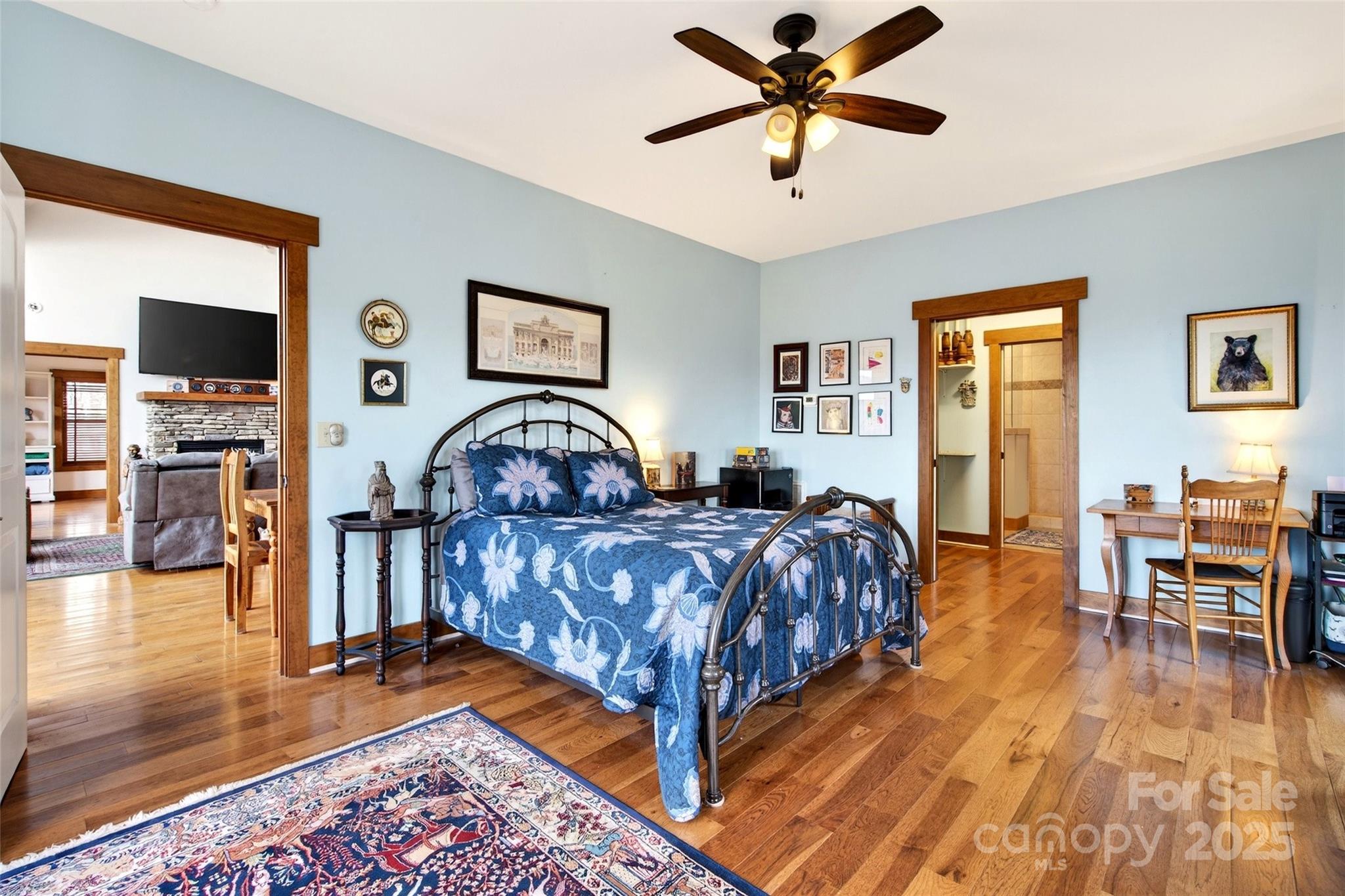 242 Lakeview Trail Nebo, NC 28761 - Photo 26 of 46 a bedroom with furniture and a wooden floor
