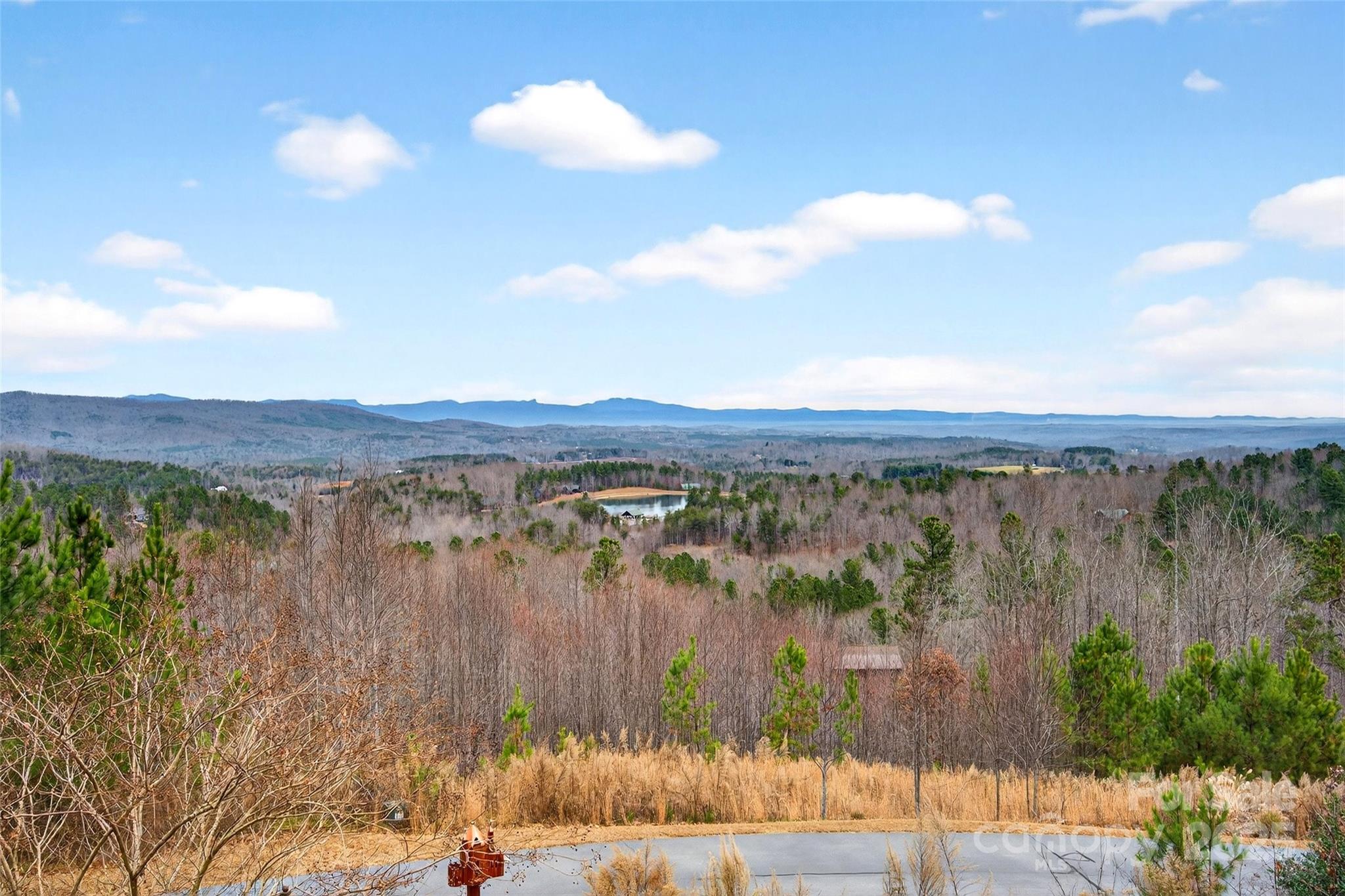 242 Lakeview Trail Nebo, NC 28761 - Photo 4 of 46 a view of lake with mountain