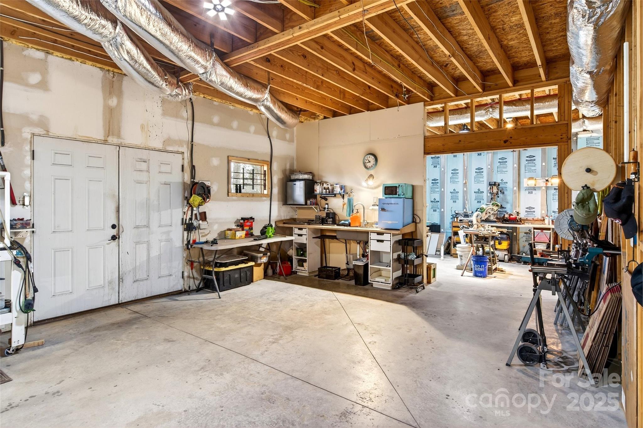 242 Lakeview Trail Nebo, NC 28761 - Photo 41 of 46 a view of a storage room with shelves