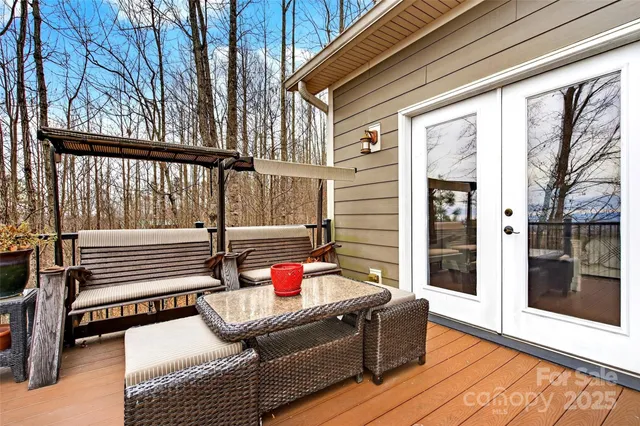 a outdoor space with patio furniture and wooden floor