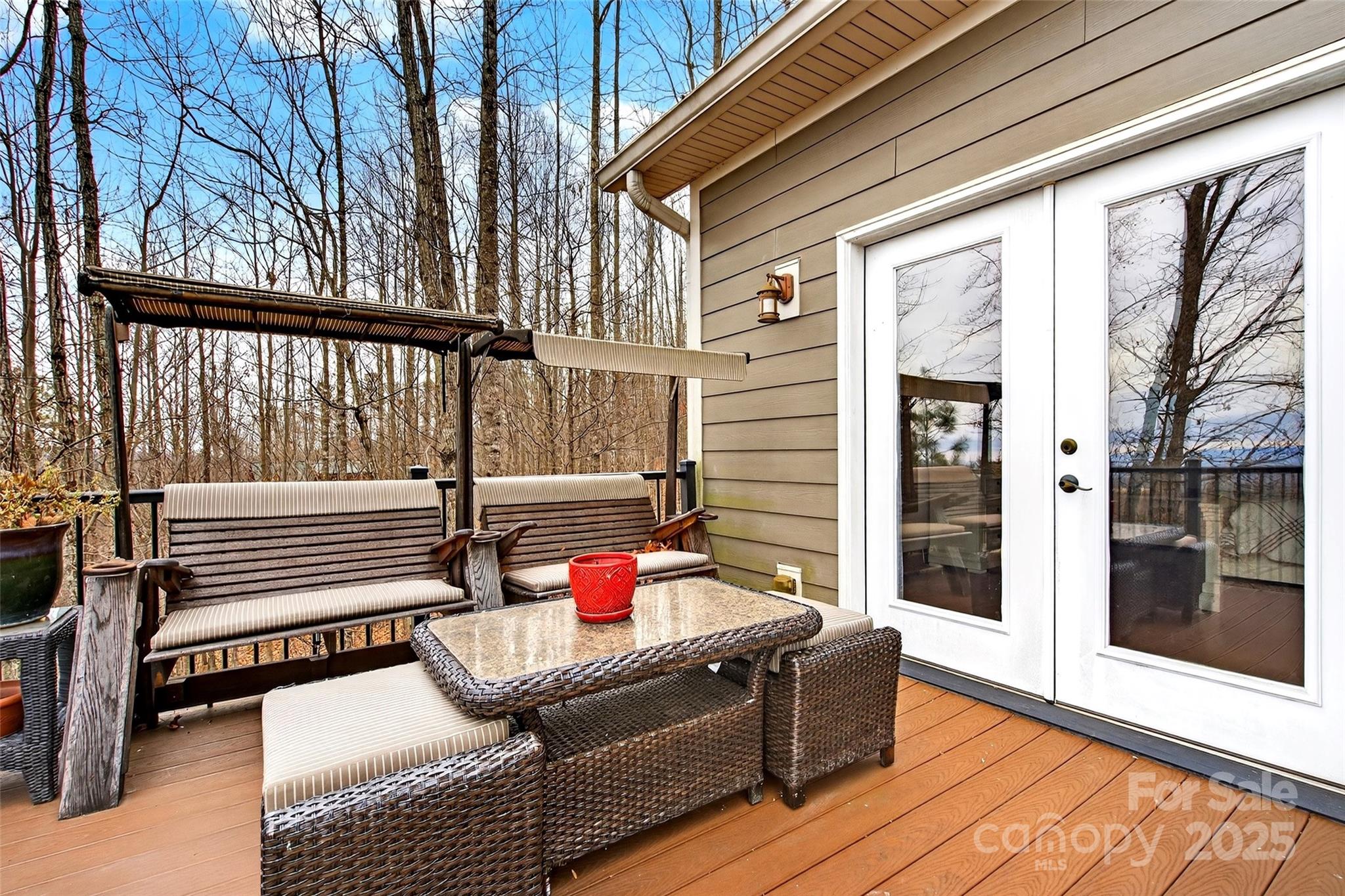 242 Lakeview Trail Nebo, NC 28761 - Photo 9 of 46 a outdoor space with patio furniture and wooden floor