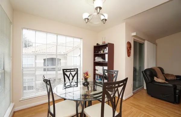 a kitchen with a sink stove and microwave