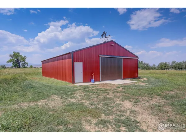 a house with yard in front of it