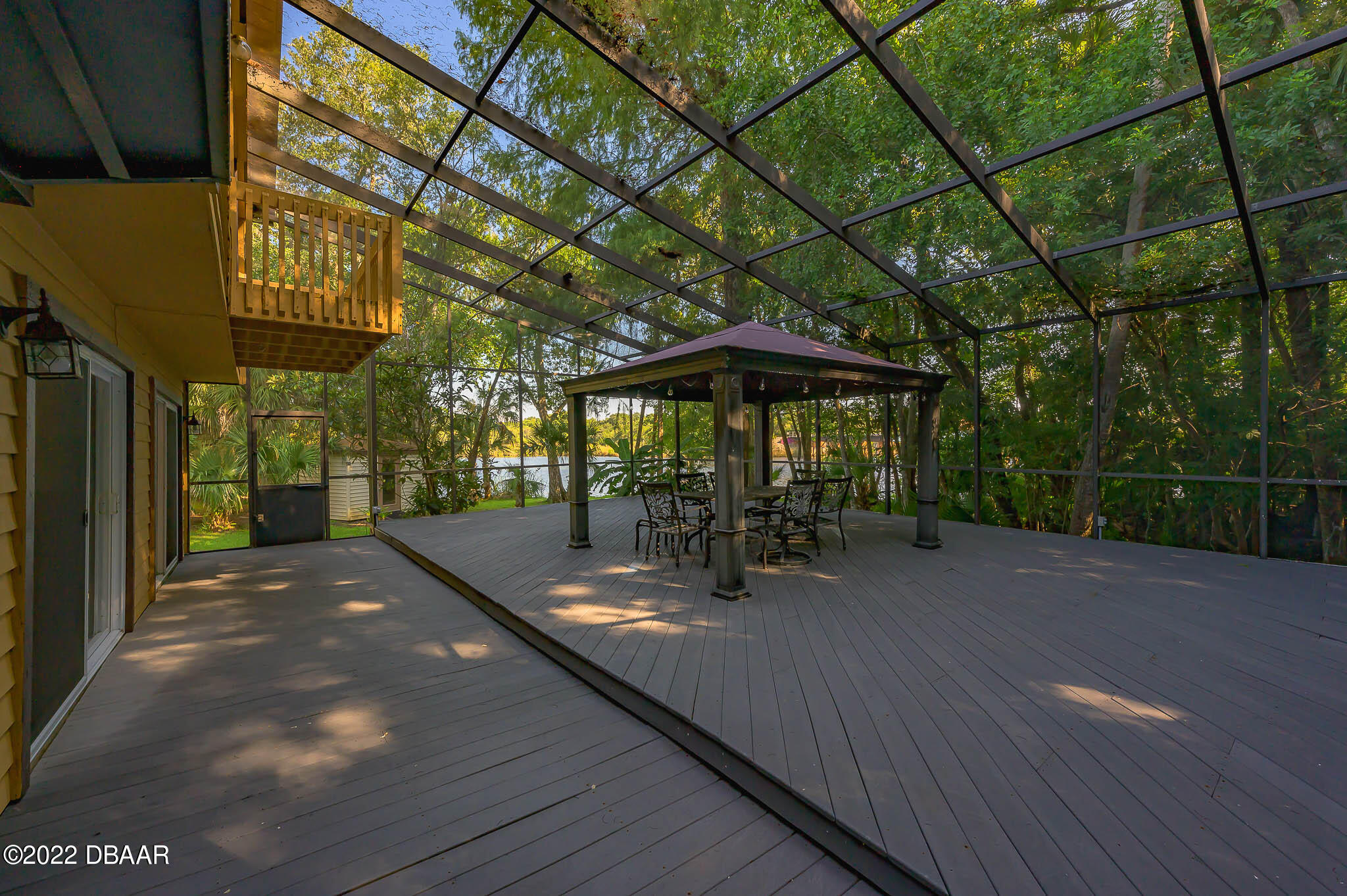 35 Pebble Beach Drive Ormond Beach, FL 32174 - Photo 33 of 45 a patio with a yard