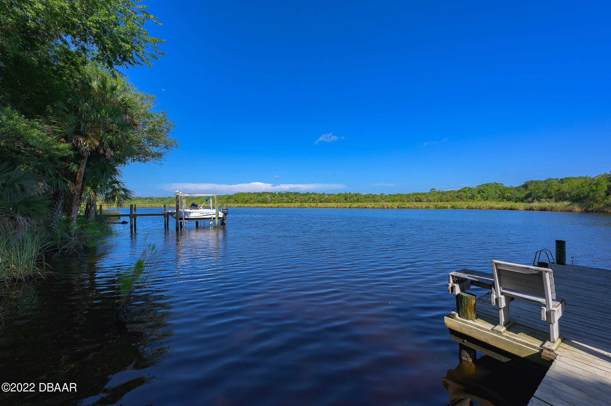 35 Pebble Beach Drive Ormond Beach, FL 32174 - Photo 36 of 45 a view of a lake with couches chairs