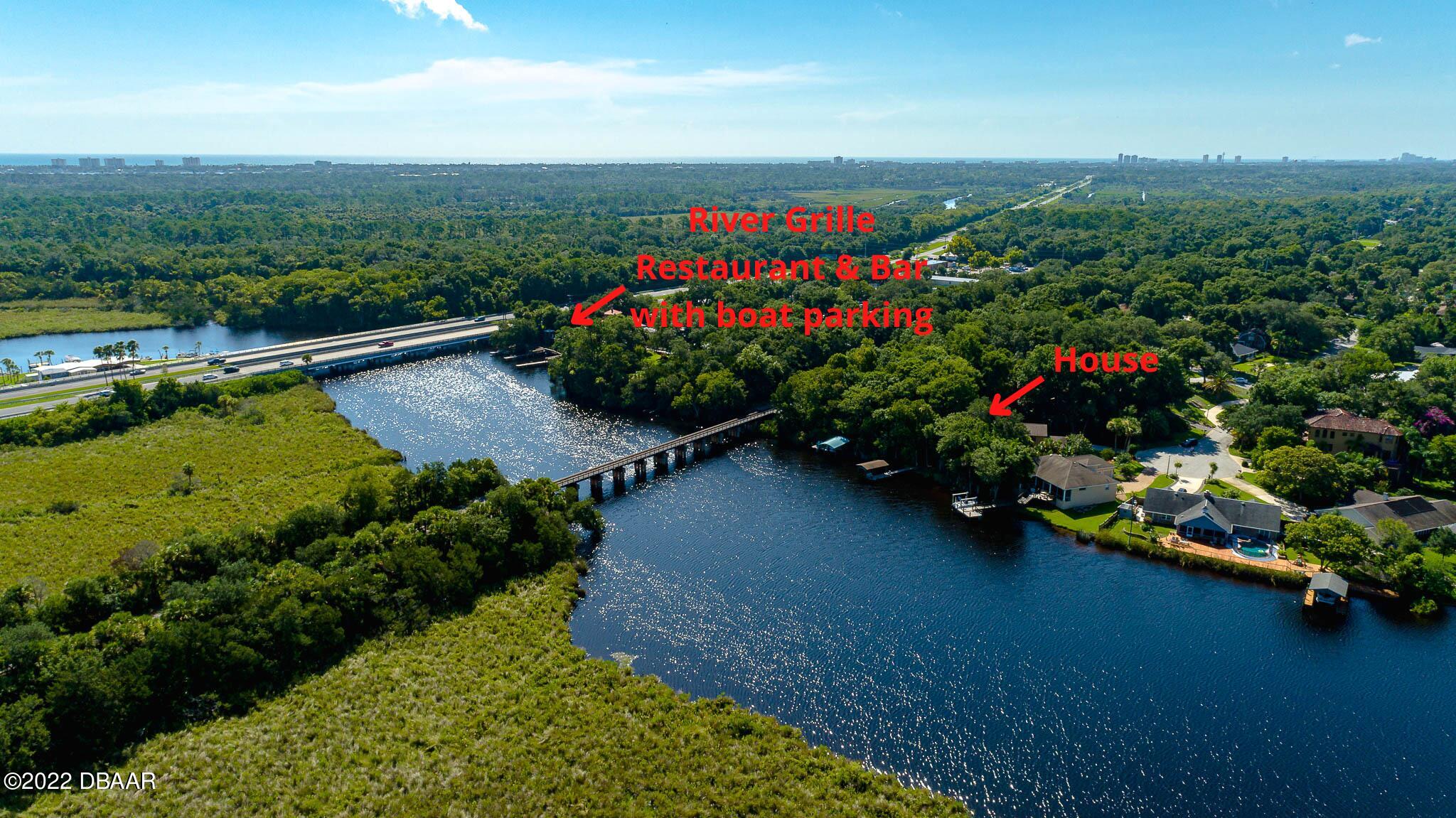 35 Pebble Beach Drive Ormond Beach, FL 32174 - Photo 40 of 45 a view of a garden with flowers