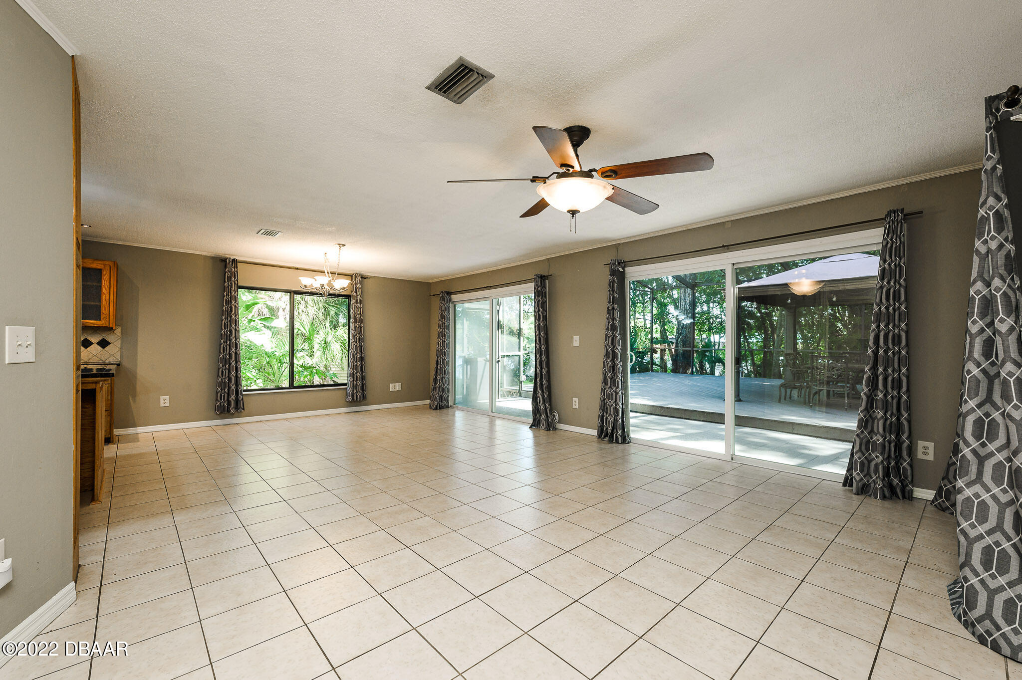 35 Pebble Beach Drive Ormond Beach, FL 32174 - Photo 7 of 45 a view of an entryway with a chandelier
