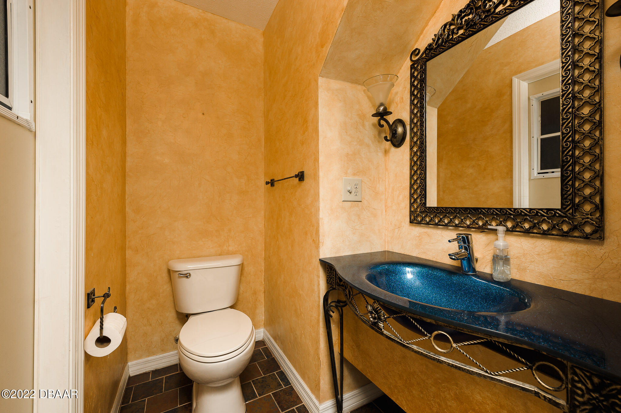 35 Pebble Beach Drive Ormond Beach, FL 32174 - Photo 9 of 45 a bathroom with a sink and a toilet