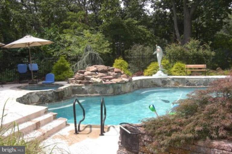1407 Brewer Neck Road Pasadena, MD 21122 - Photo 21 of 22 Heated guinite pool slopes to 8ft w/ jacuzzi