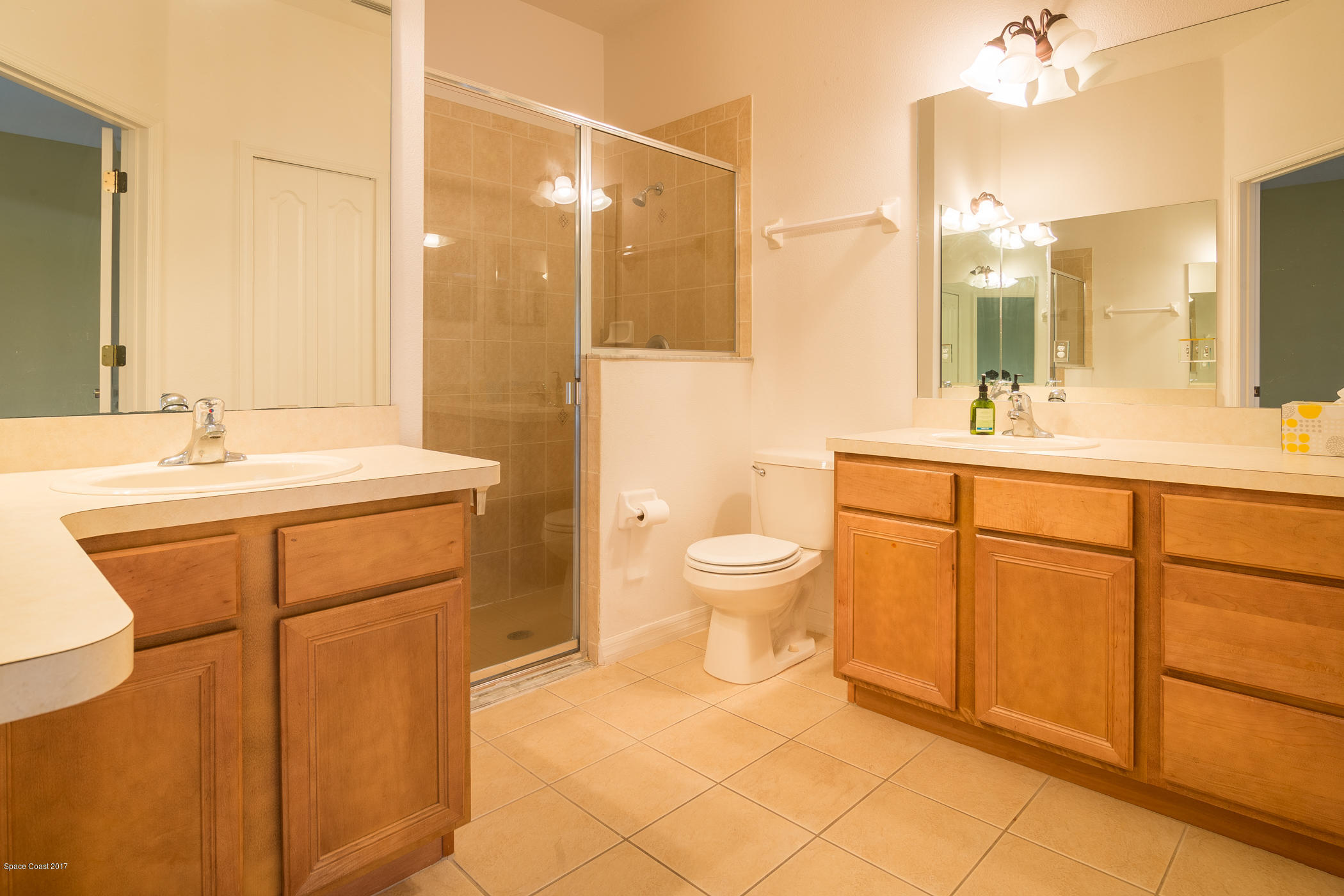 1875 Dragon Road Southeast Palm Bay, FL 32909 - Photo 12 of 18 Master Bathroom with Dual Vanity and