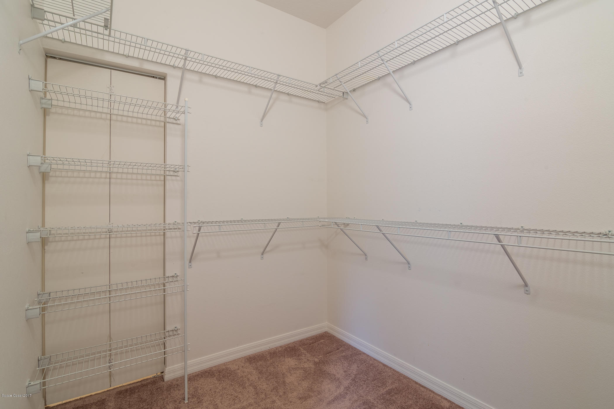 1875 Dragon Road Southeast Palm Bay, FL 32909 - Photo 13 of 18 Walk In Master Closet
