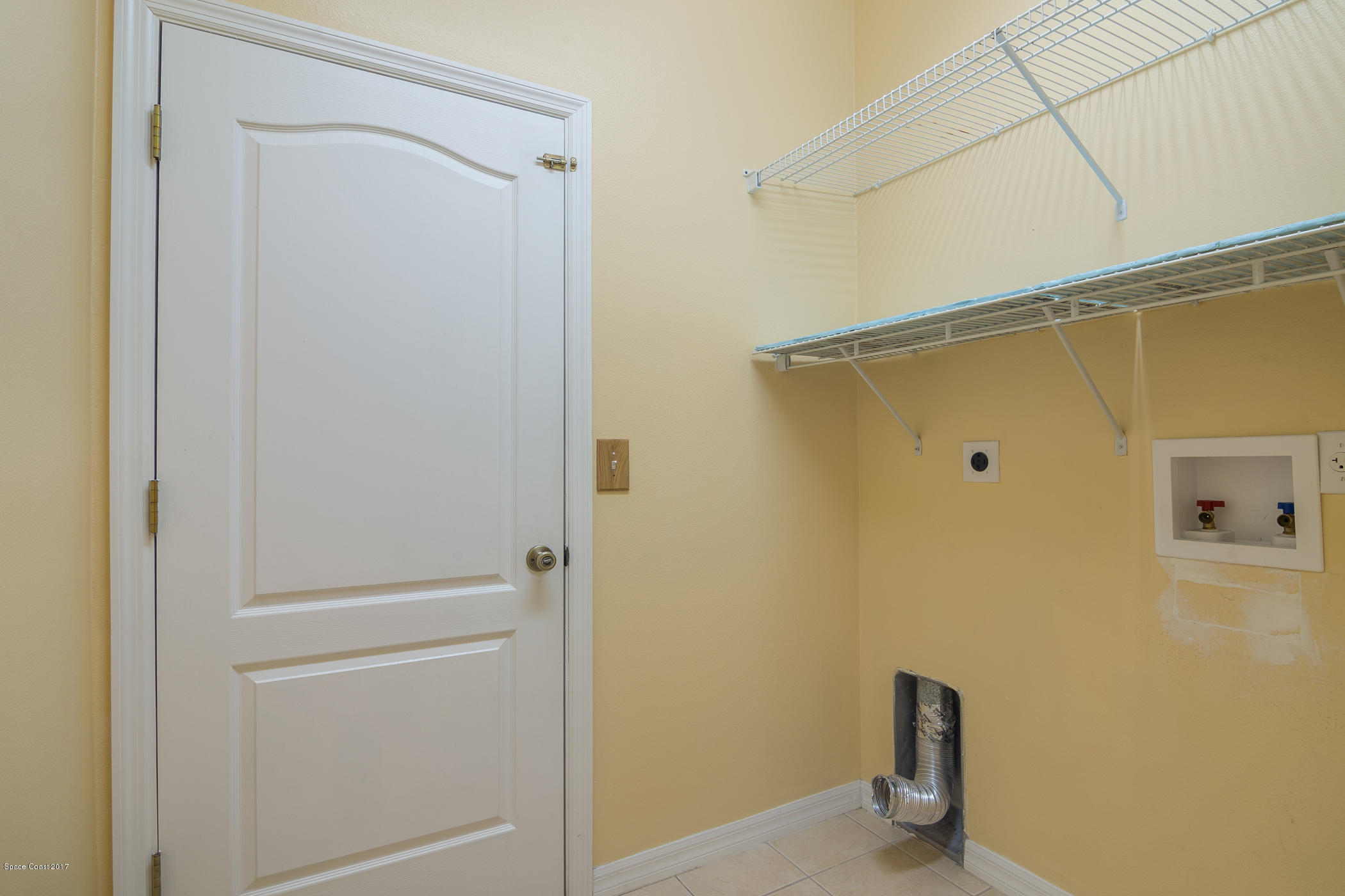 1875 Dragon Road Southeast Palm Bay, FL 32909 - Photo 17 of 18 Laundry room