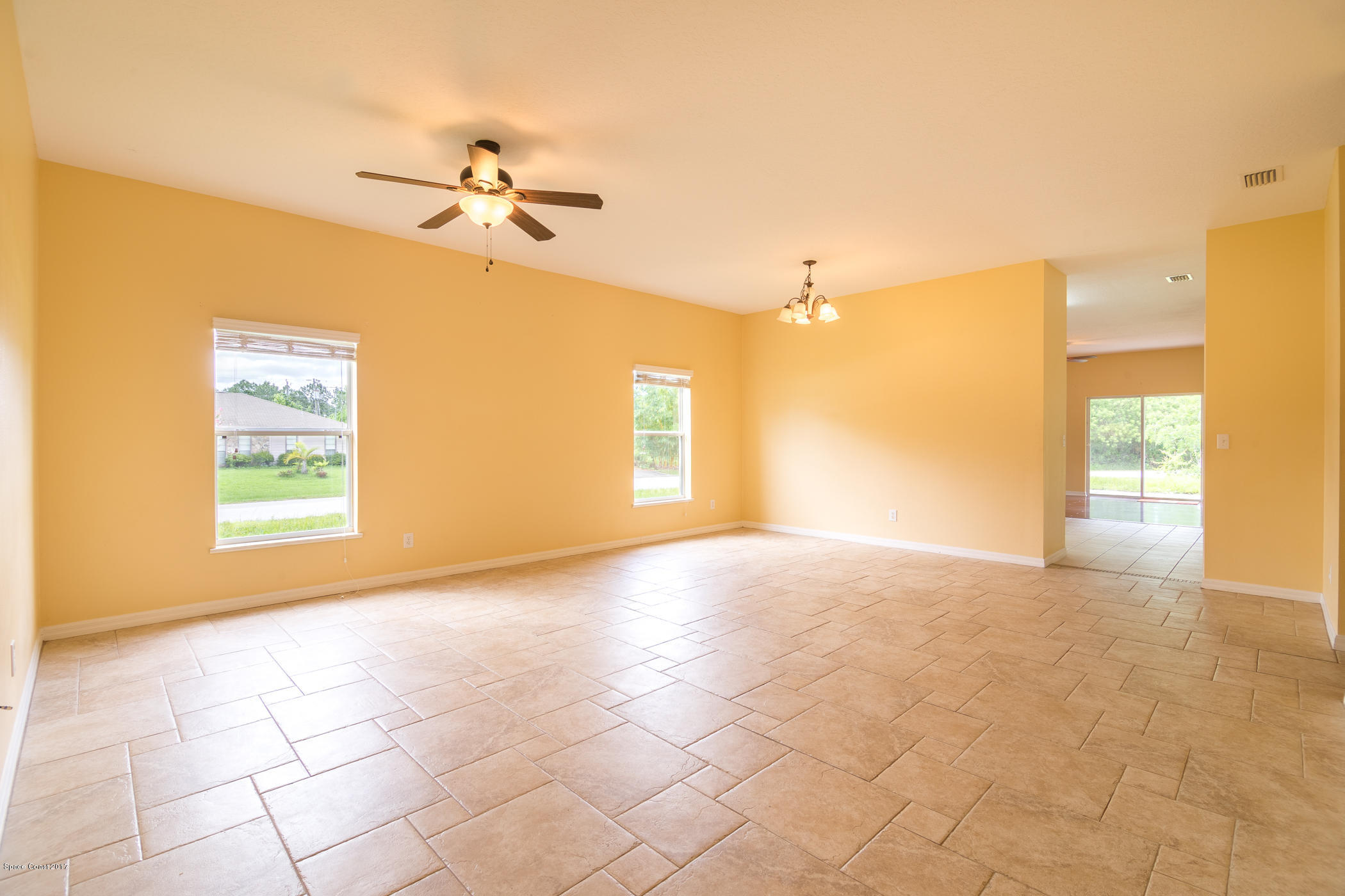 1875 Dragon Road Southeast Palm Bay, FL 32909 - Photo 5 of 18 Living room w/dining area