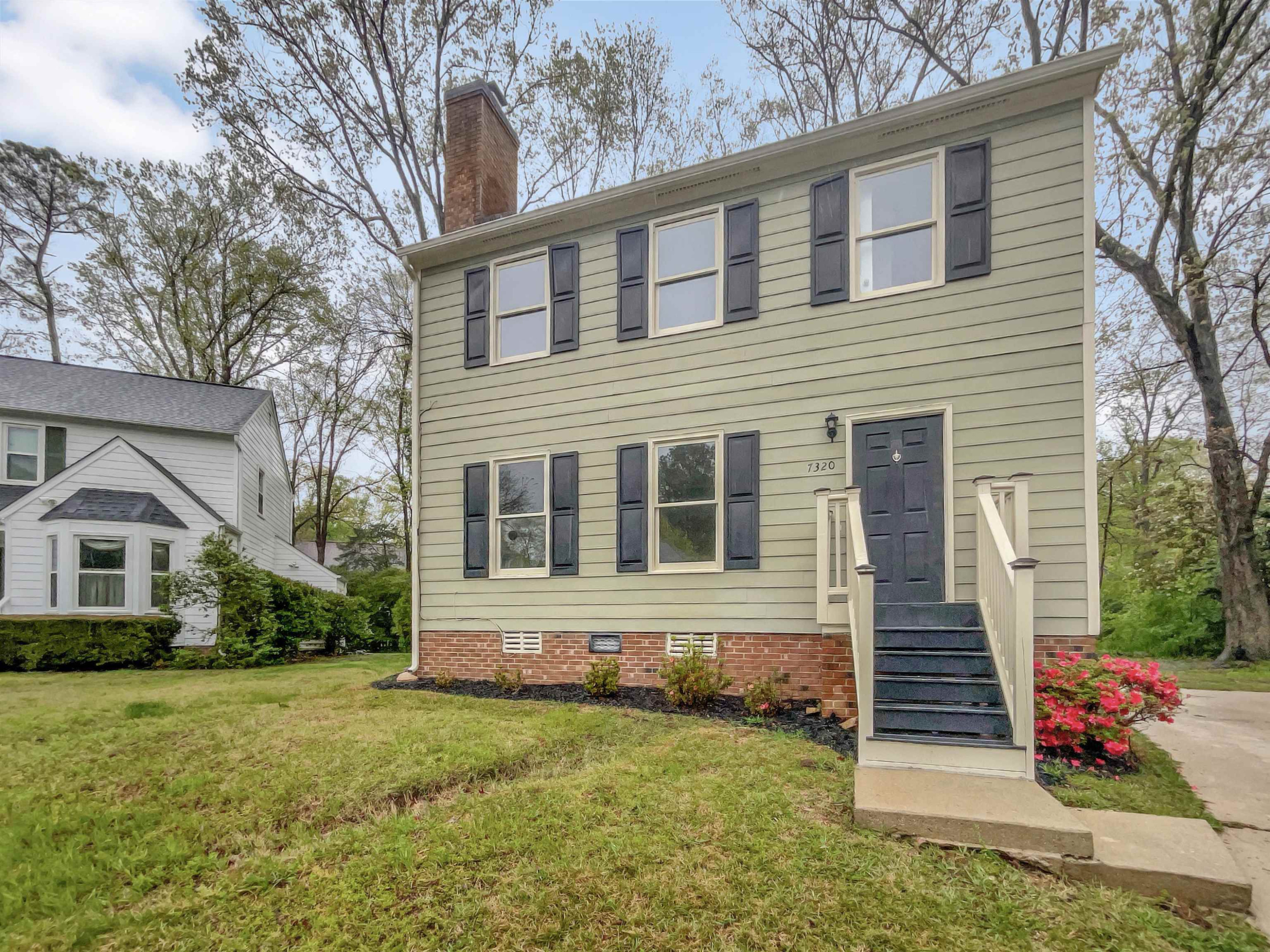 7320 Ewing Place Raleigh, NC 27616 - Photo 1 of 19 a front view of a house with garden