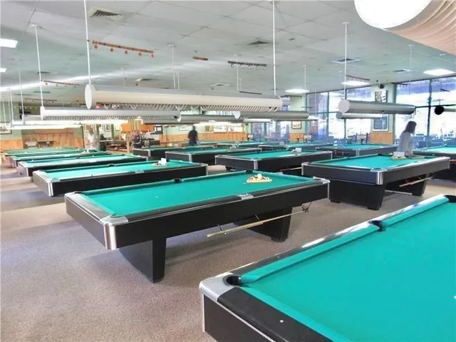 a room with chairs and table