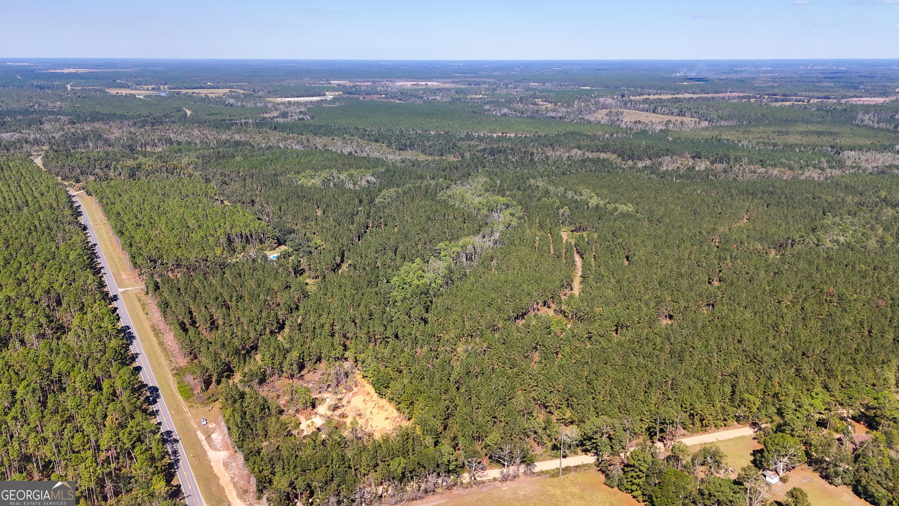 0 4th Street Extension Alma, GA 31510 - Photo 2 of 27 a view of a lake with a city