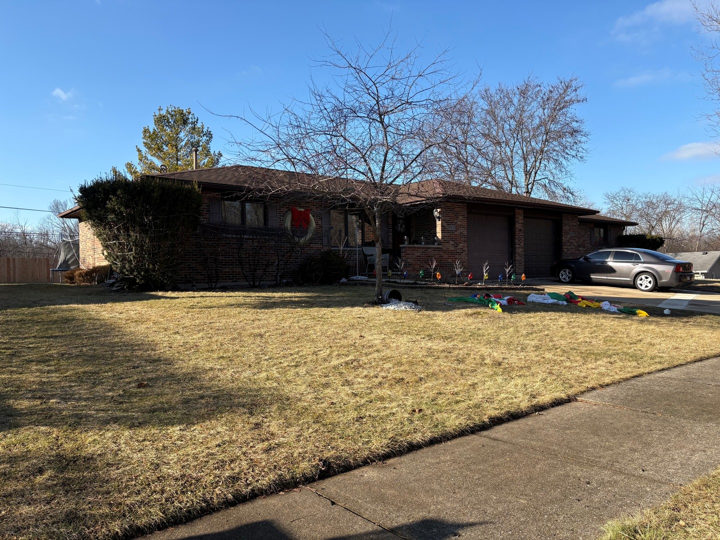 700 South McAree Road Waukegan, IL 60085 - Photo 1 of 1 a view of a house with snow on the road