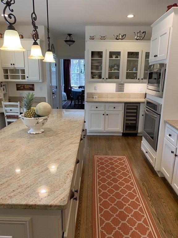 39 Vine Brook Road Medfield, MA 02052 - Photo 13 of 42 a kitchen with stainless steel appliances granite countertop a stove a sink and a refrigerator